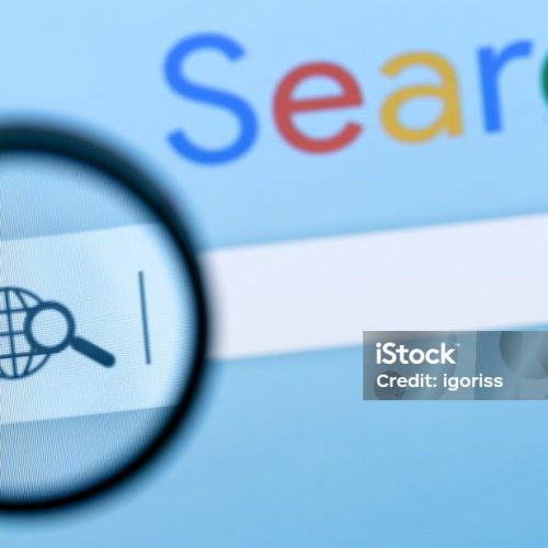 Internet browser search bar with magnifier on computer screen with text Search